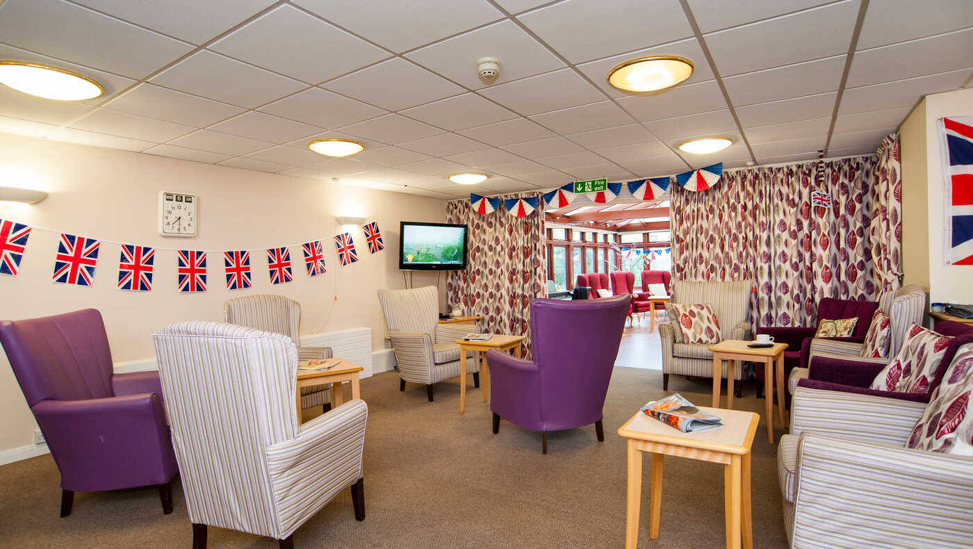 Common area with seating and decorations for a celebration