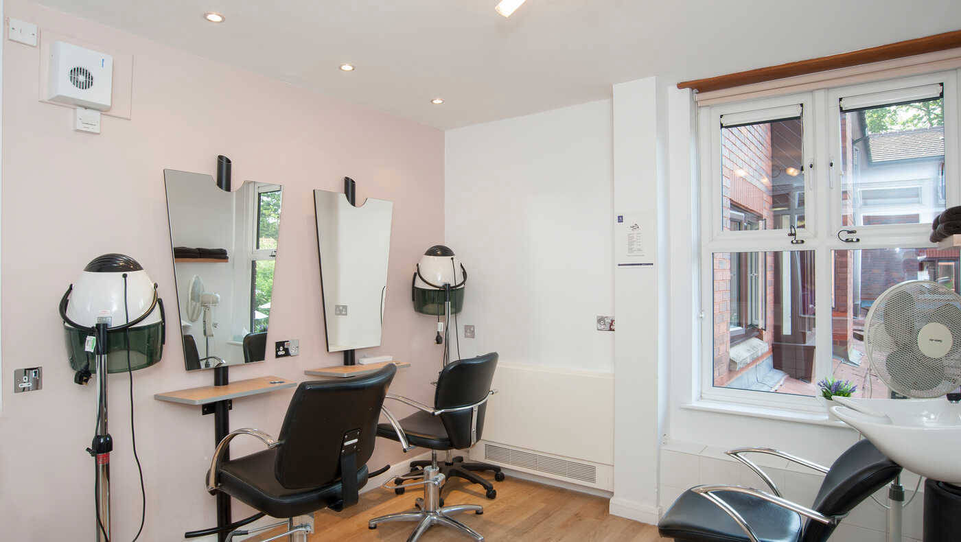 Interior of a hair salon with styling chairs