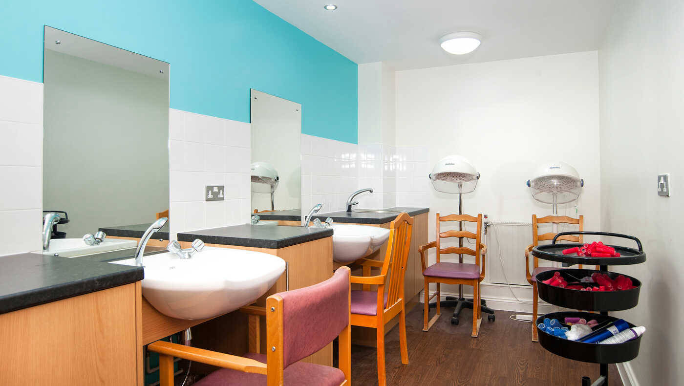 Hair salon area with drying stations