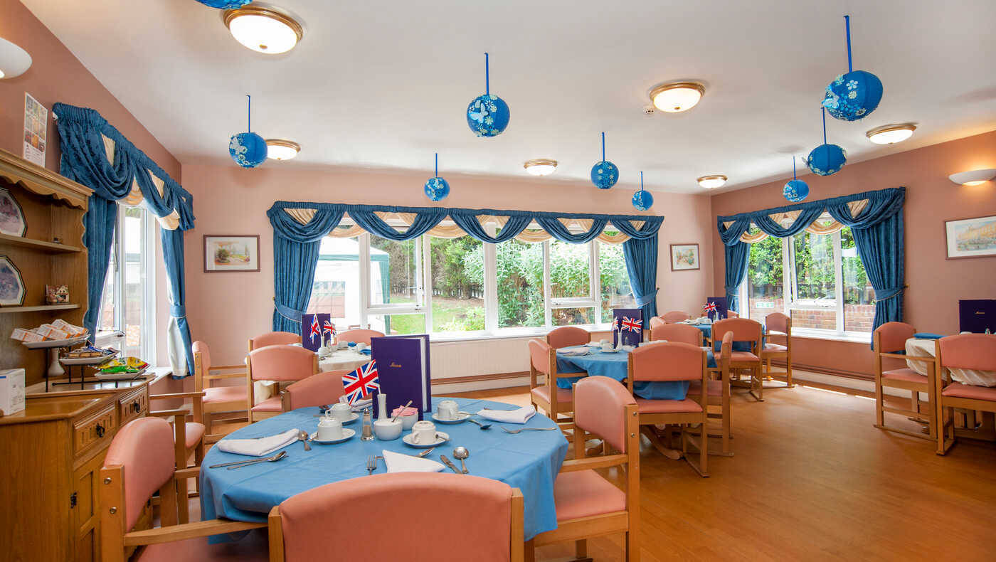 Dining area with tables set for a meal
