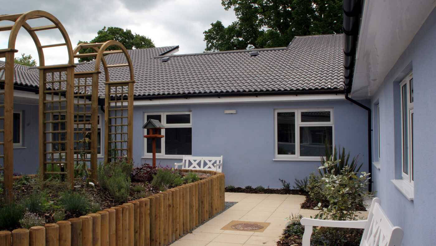 Outdoor space with garden and nearby building