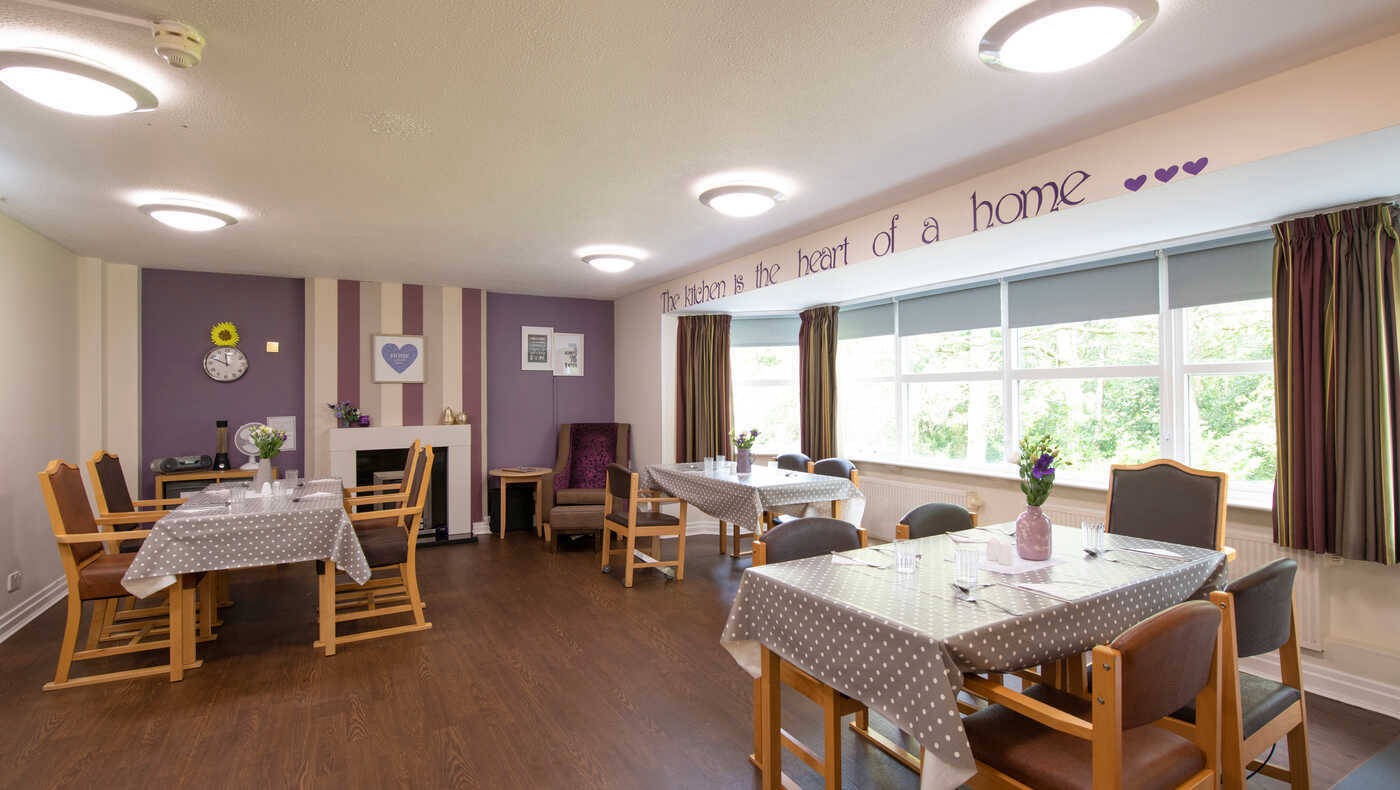 Bright dining area with tables set for meals