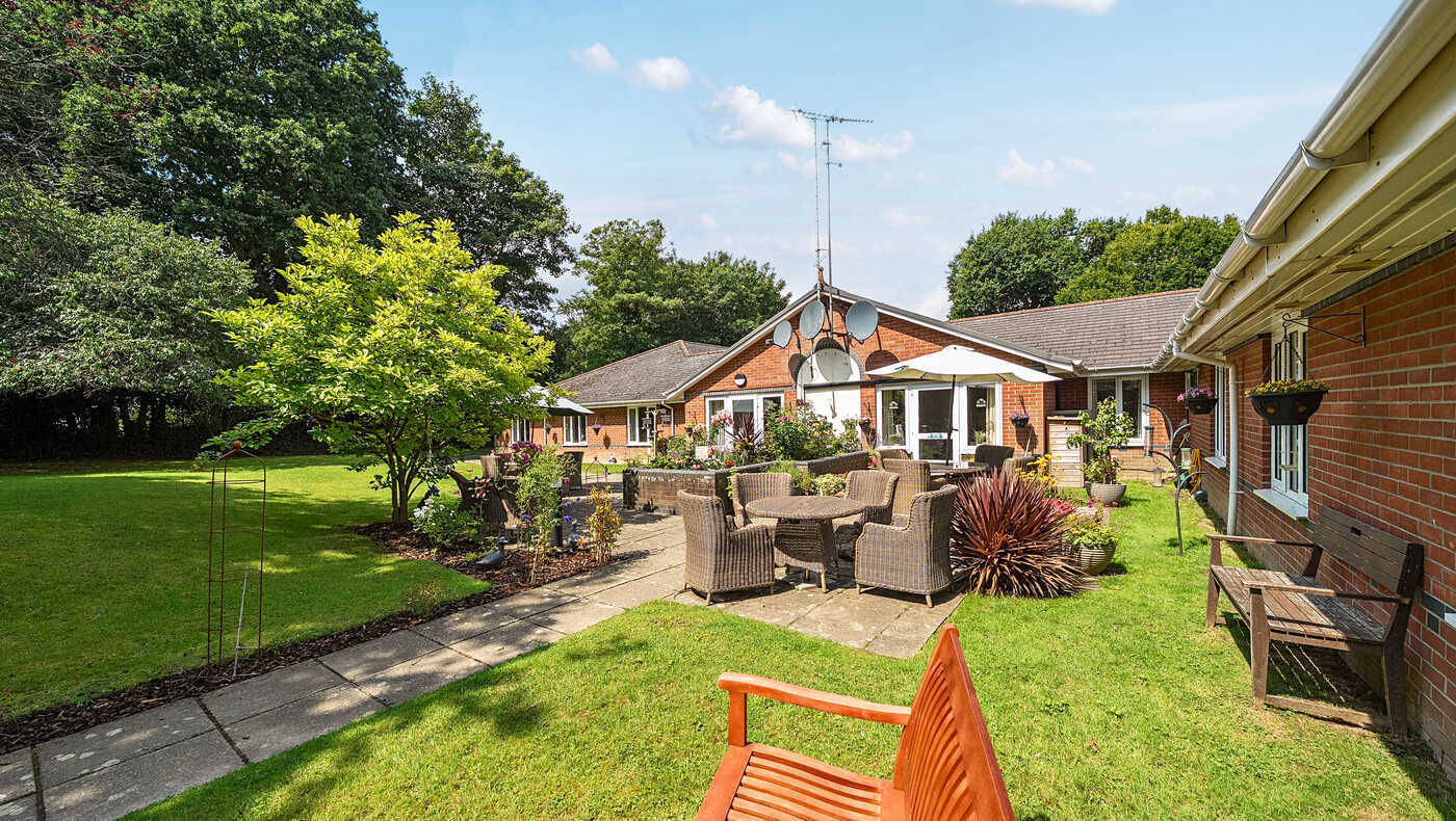 Outdoor seating area with landscaping and pathways
