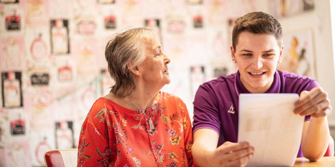 A resident and staff member sharing a moment together