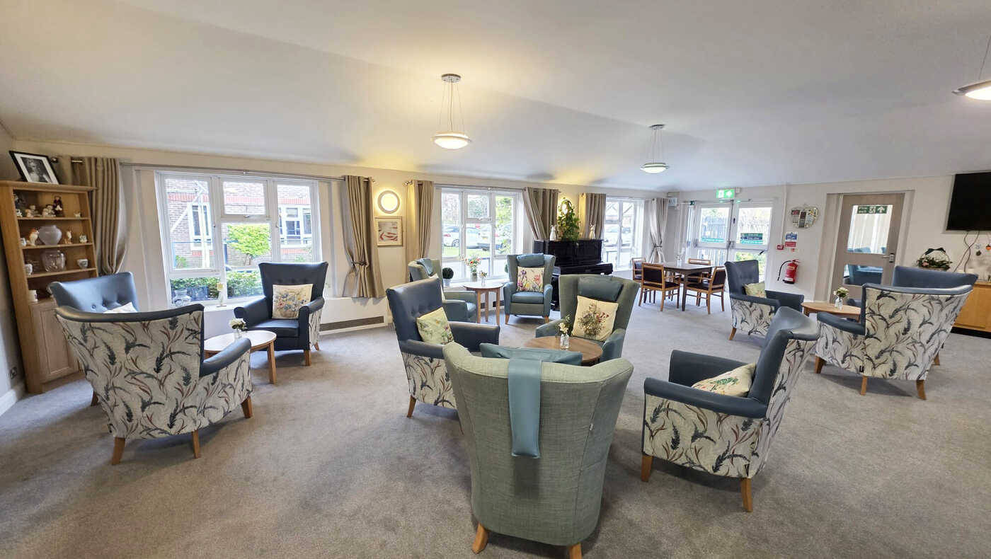 Common area with comfortable seating and piano