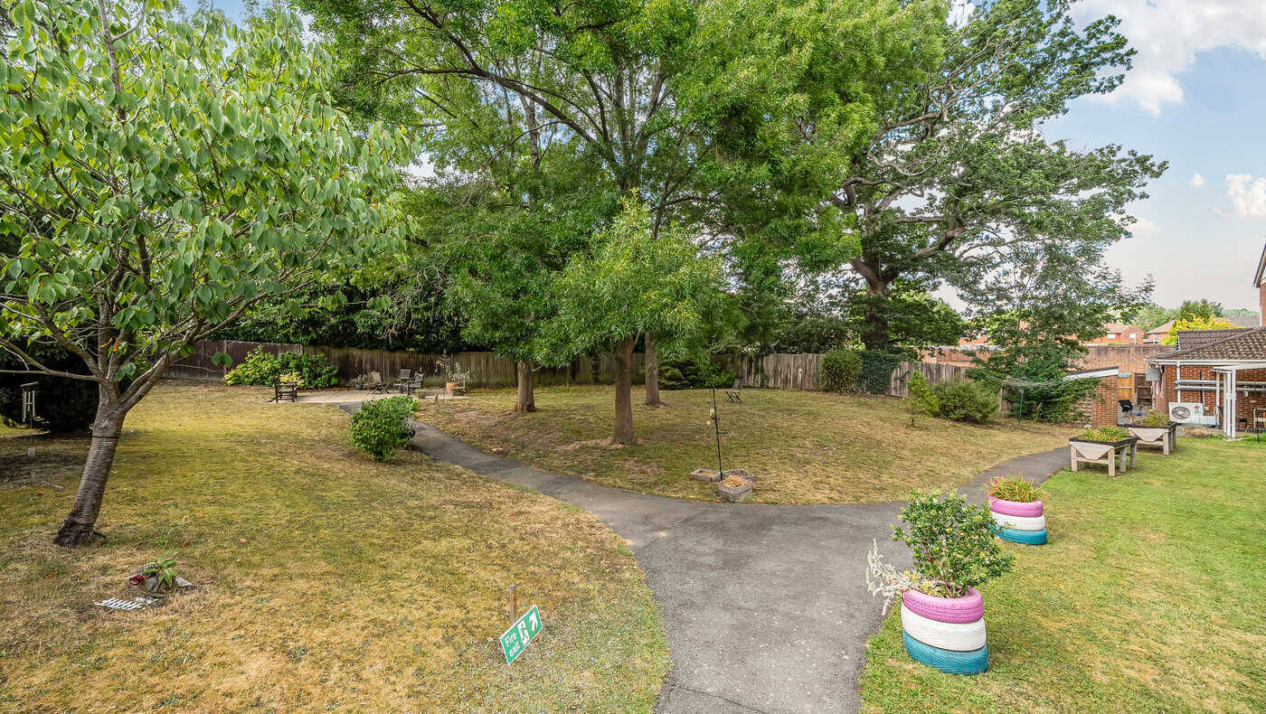 Outdoor garden area with paths and seating