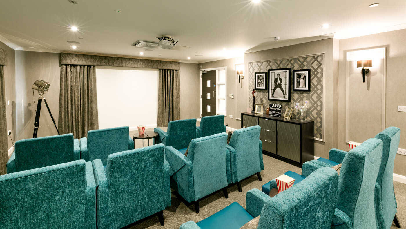 Cozy interior theater room with seating
