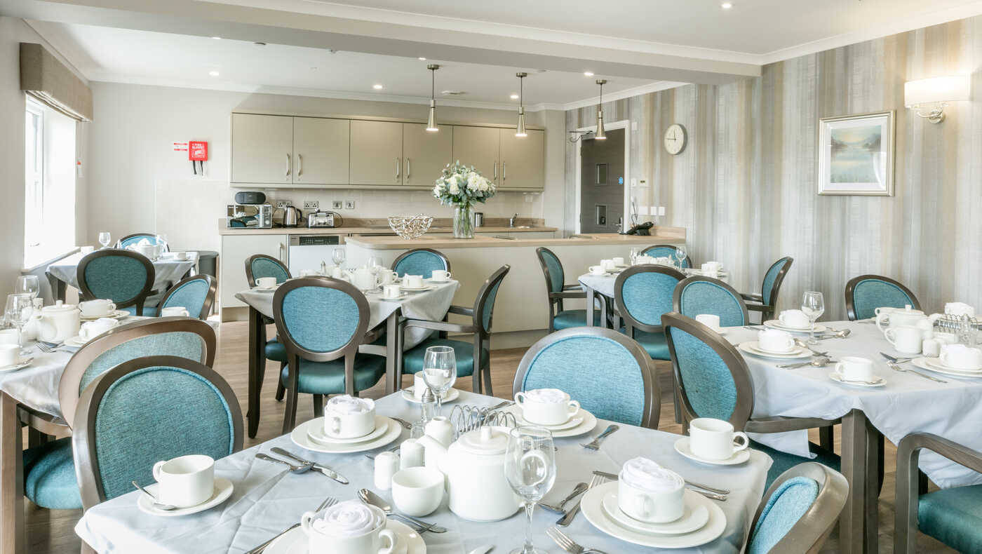 Elegant dining area set for a meal