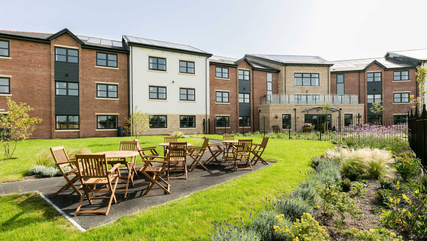 Exterior view of Mill View with outdoor seating area