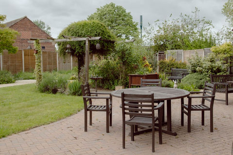 Garden area with seating and greenery