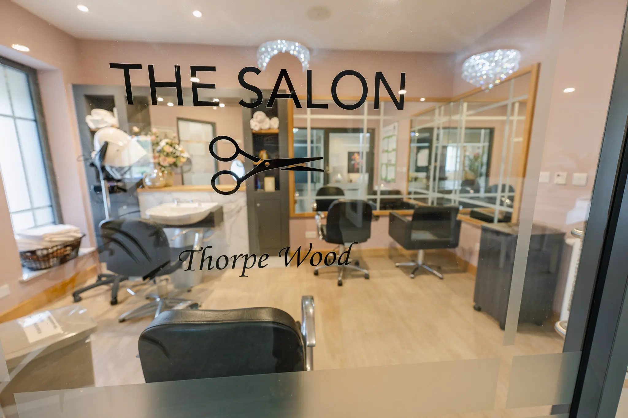 Interior view of the salon area with styling chairs.