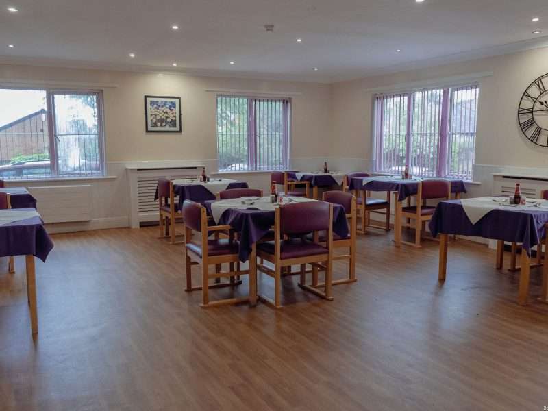 Dining area with tables and chairs set up