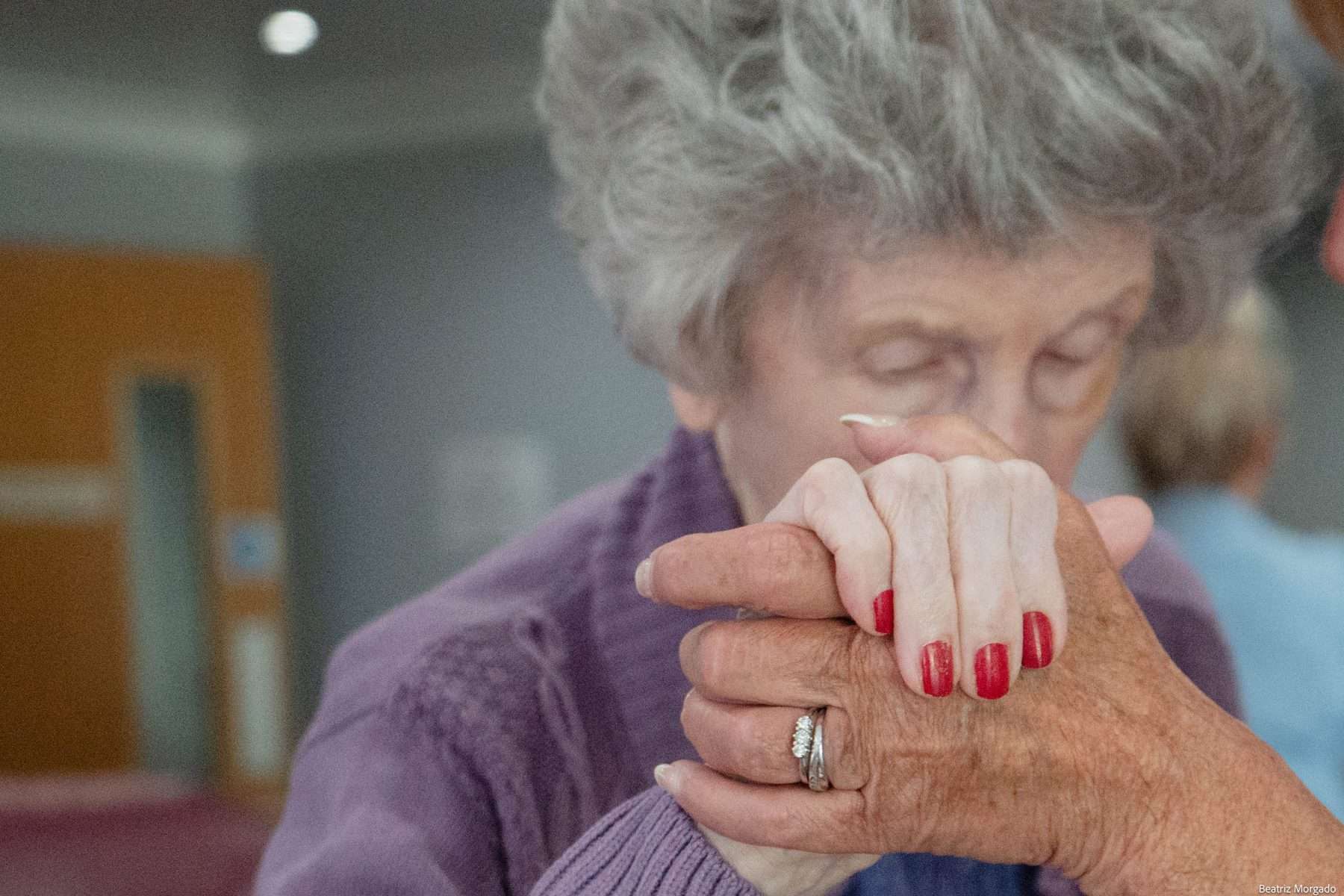 Two hands clasped, symbolizing connection.
