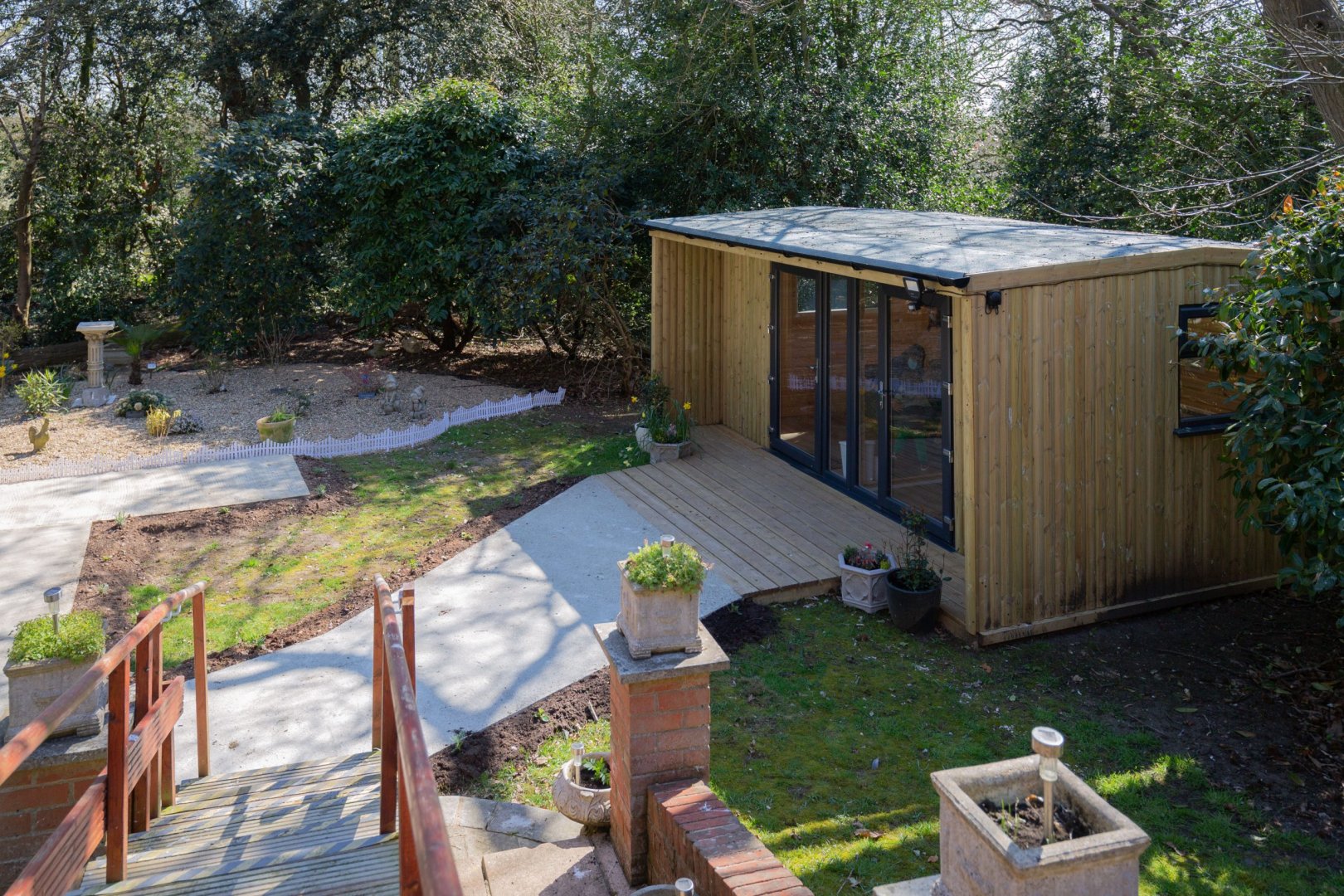 Outdoor space with a new wooden structure