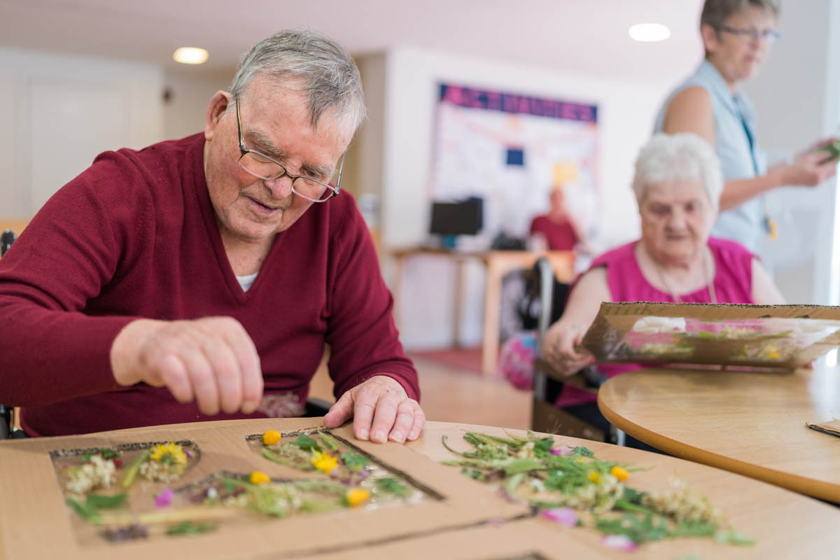 Residents engaging in a craft activity