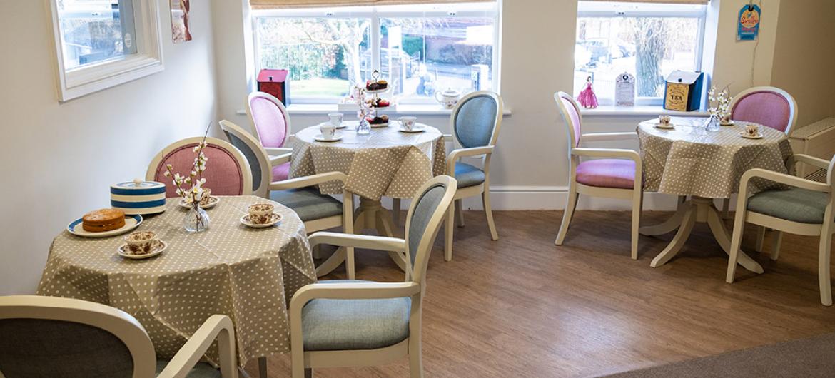 Dining area with tables set for tea