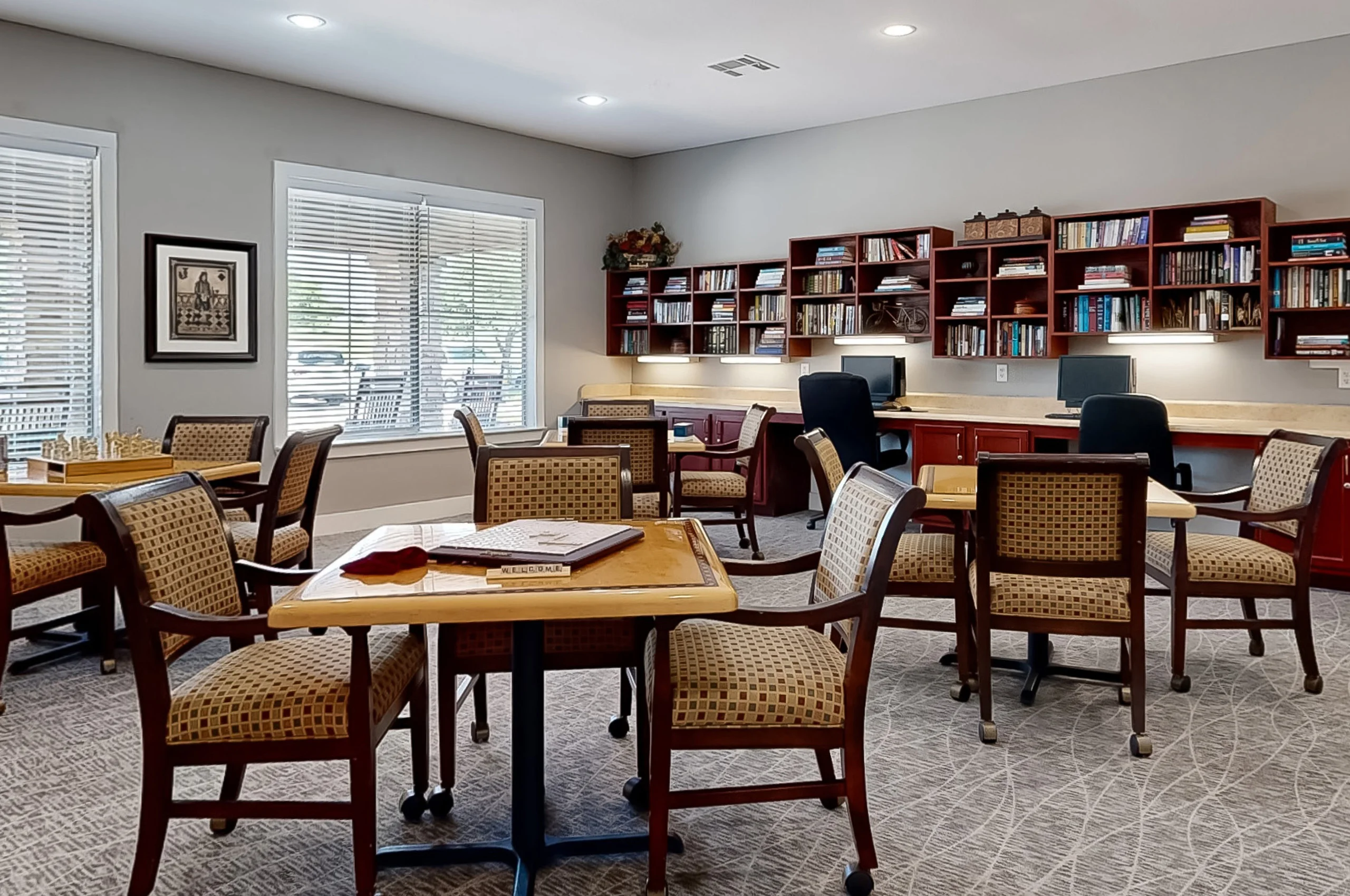Common area with seating and bookshelves