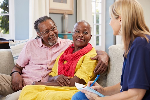 Residents and staff engaging in conversation
