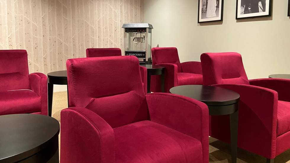 Cozy red chairs in a common area