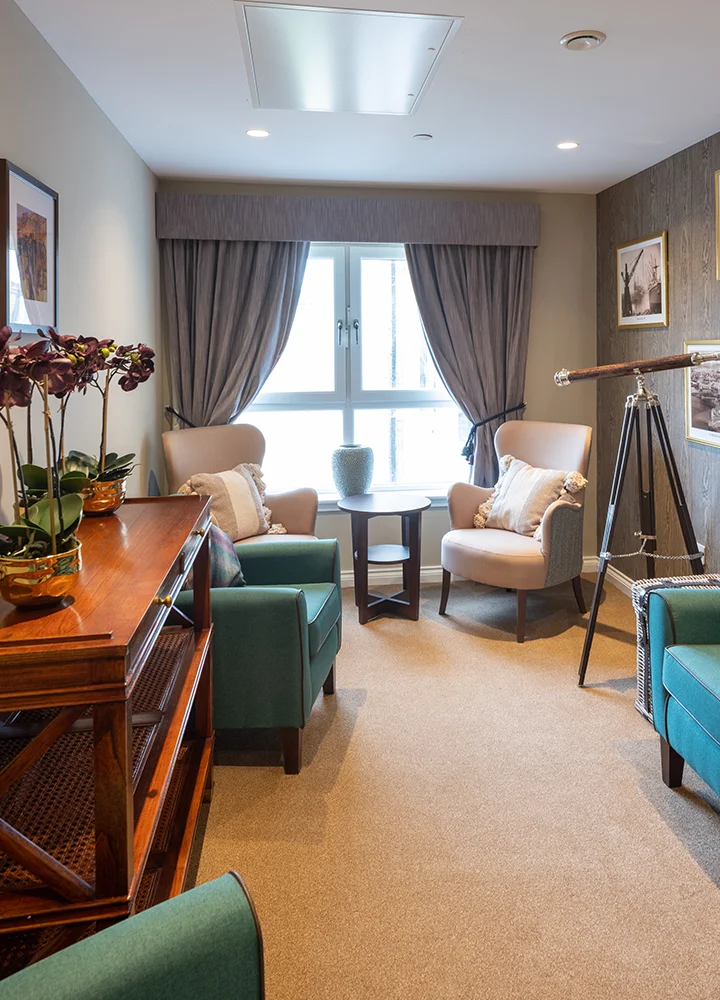Cozy common area with seating and decor.