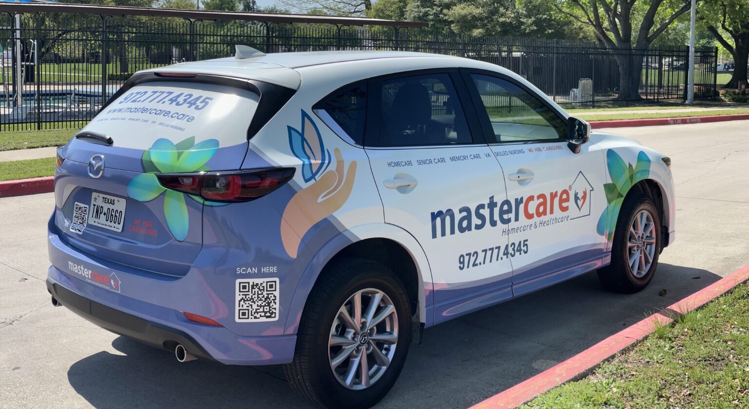 Vehicle with Mastercare branding parked outside