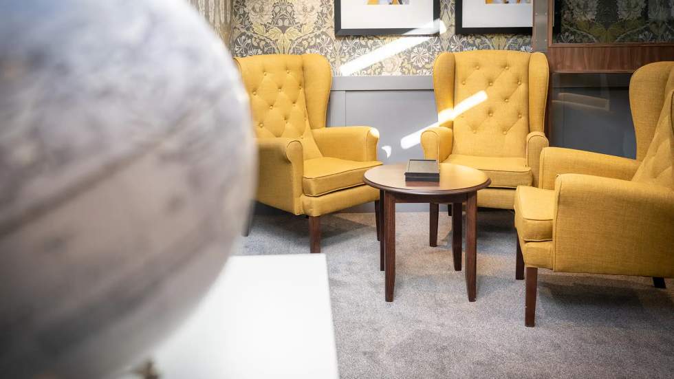 Cozy seating area with yellow armchairs