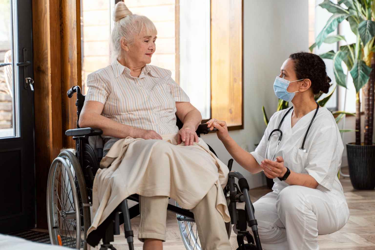 Caregiver assisting an elderly resident in a facility
