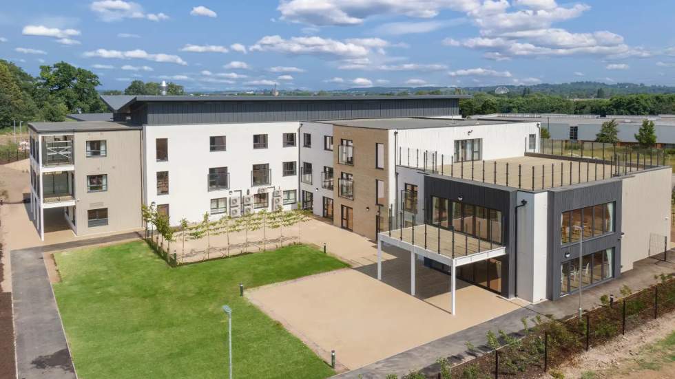 Aerial view of Escan Manor's exterior layout.