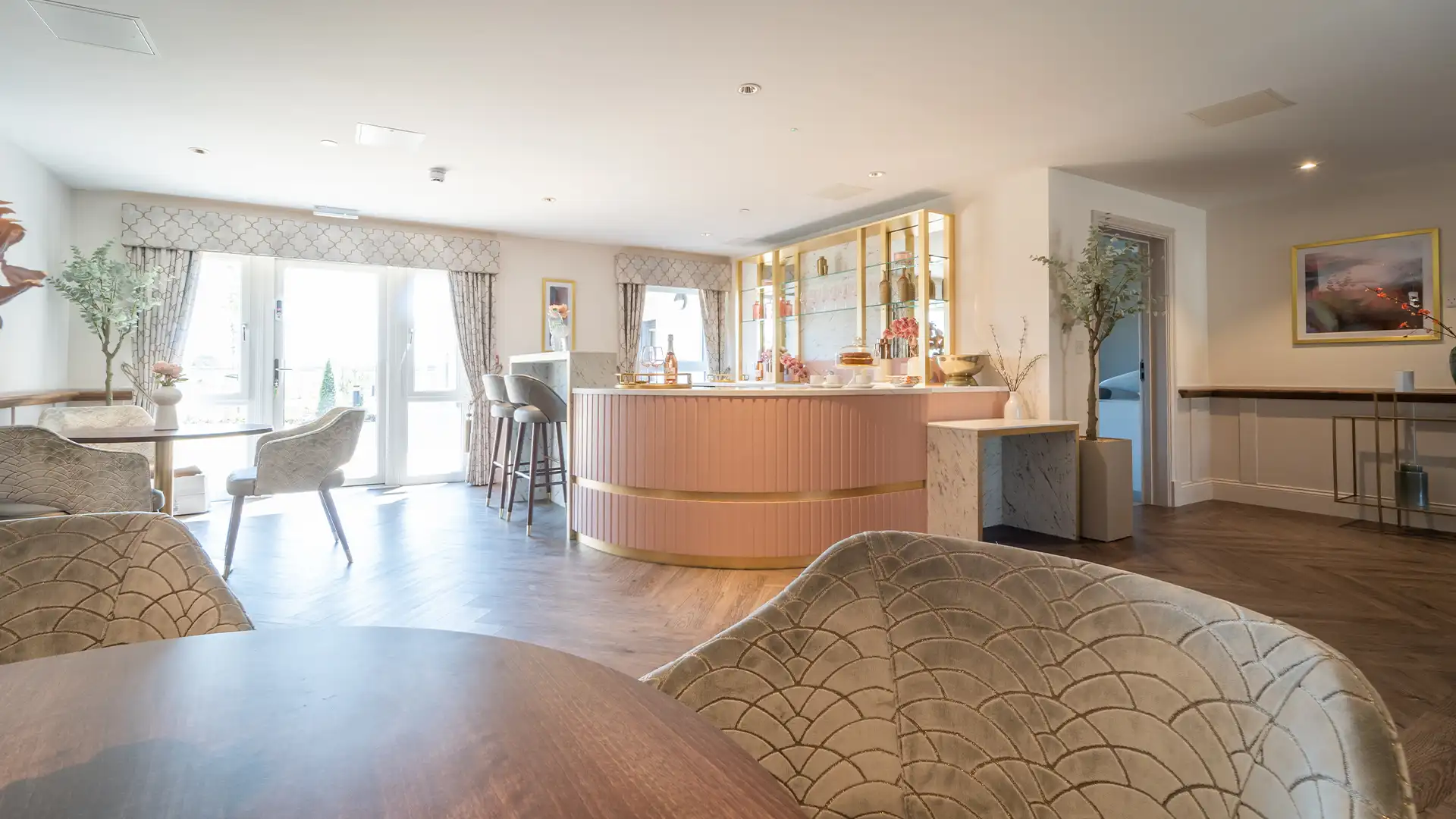 Stylish lounge area with bar and seating.