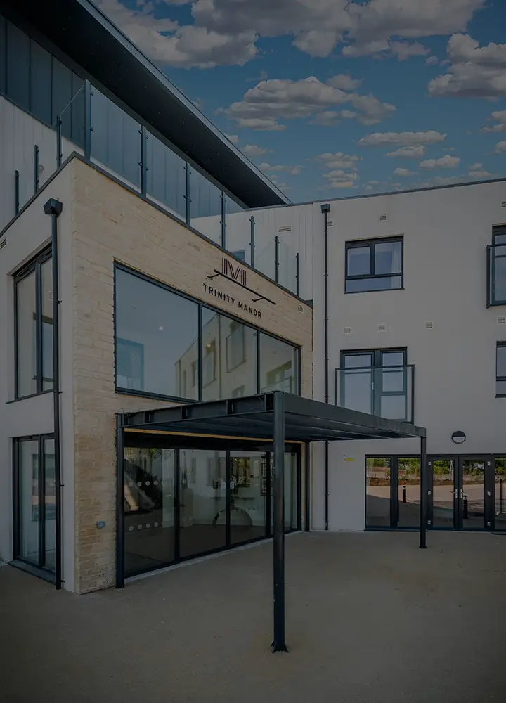 Exterior view of Trinity Manor building entrance.
