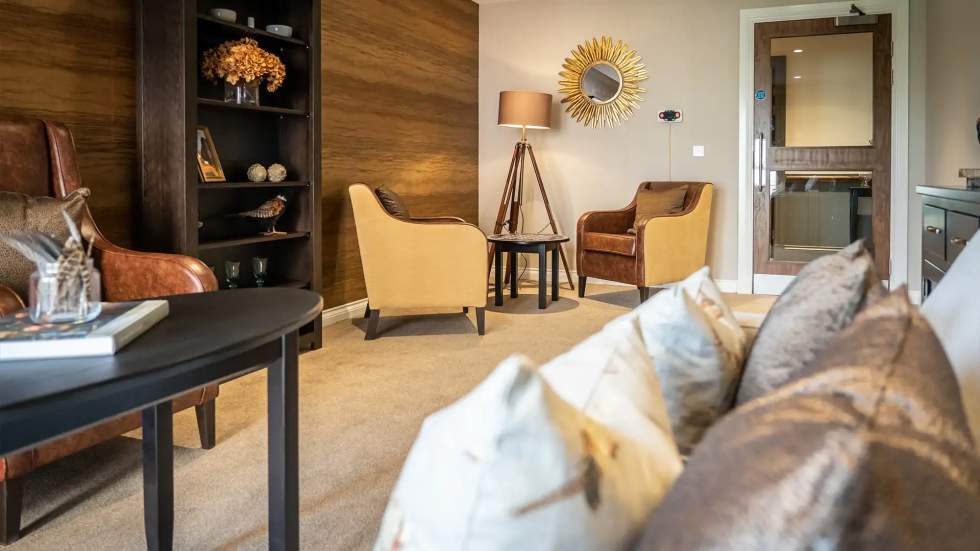 Cozy common area with seating and decorative elements.