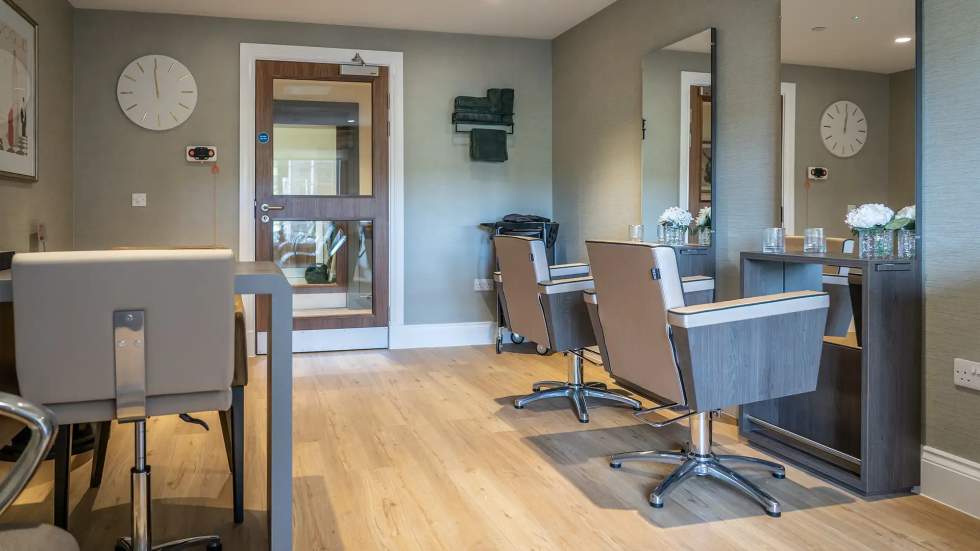 Modern interior space with salon chairs