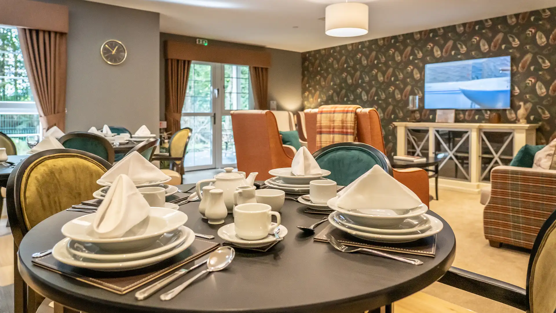 Dining table set with dishes and cups