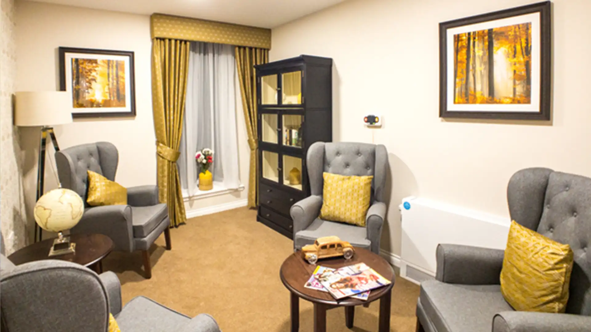 Cozy common area with armchairs and decor
