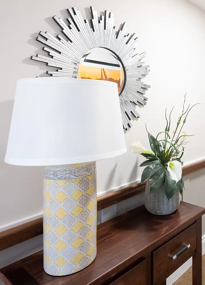 Decorative lamp and vase in a facility interior