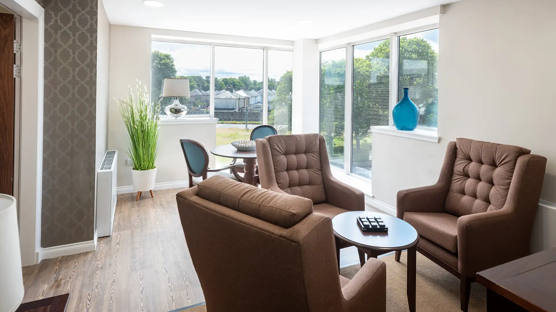 Cozy common area with seating and natural light