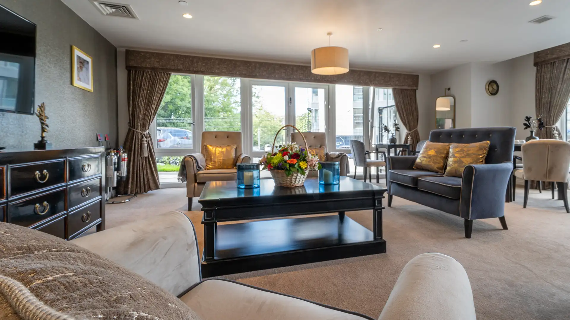 Cozy common area with comfortable seating and natural light