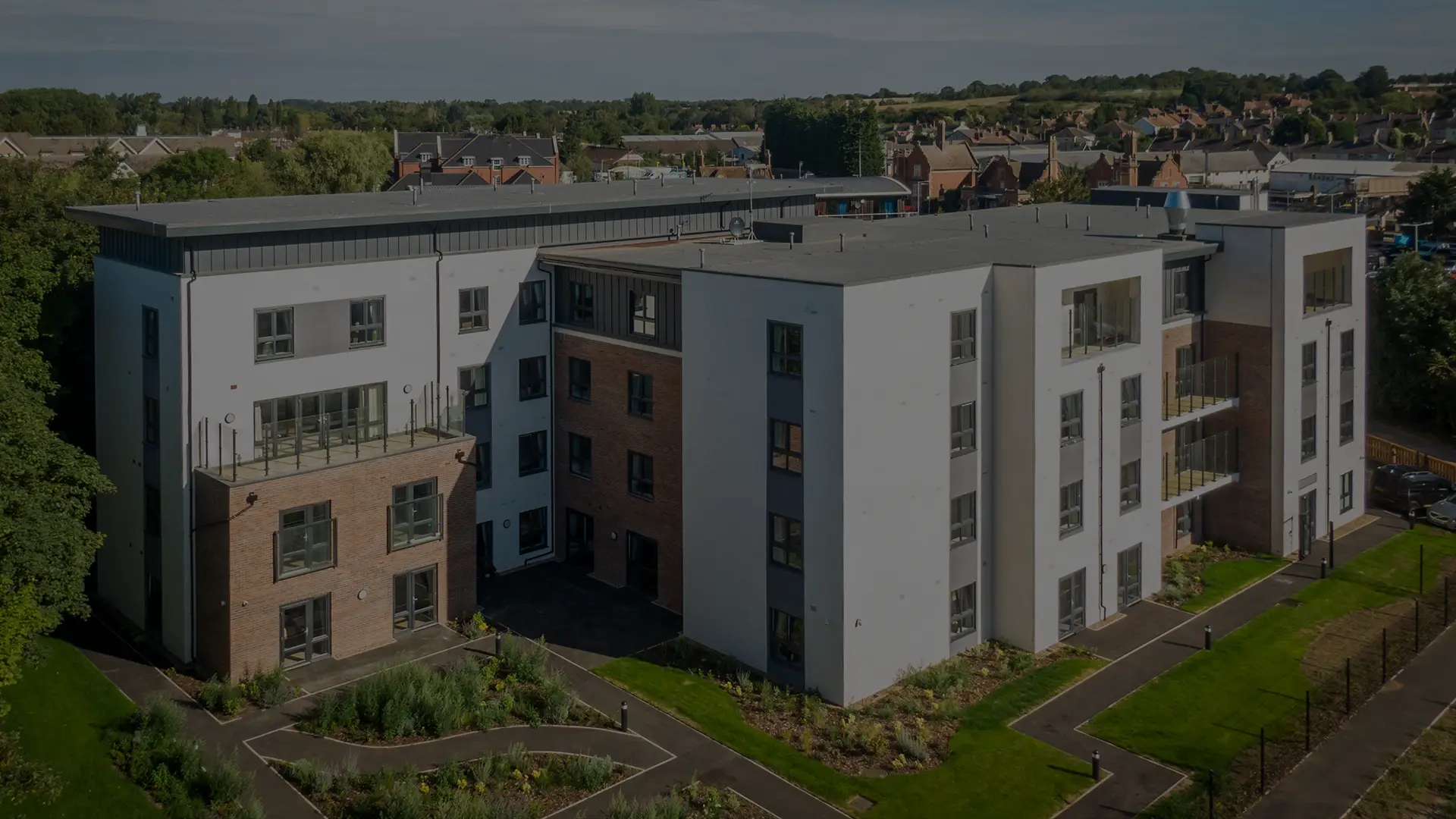 Aerial view of Escan Manor facility exterior.