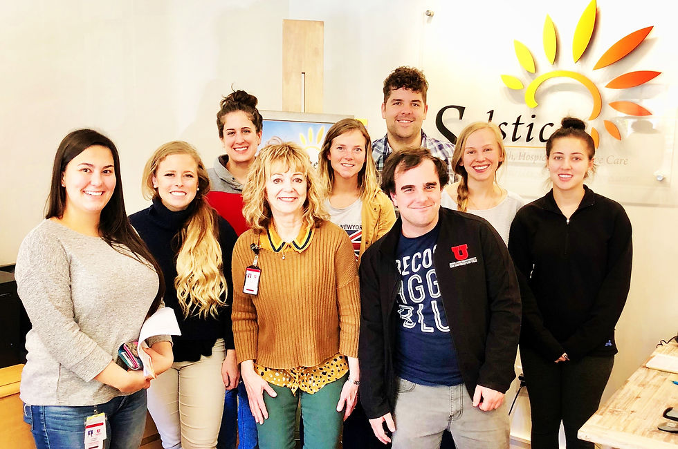 Staff members posing in a common area