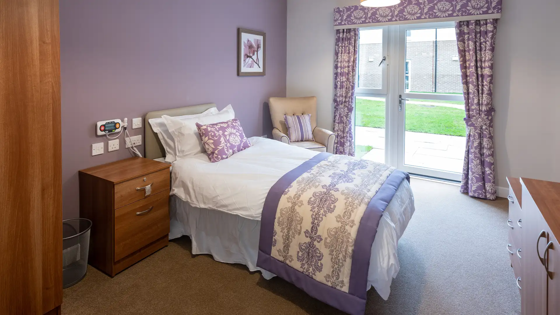 Cozy resident room with purple decor