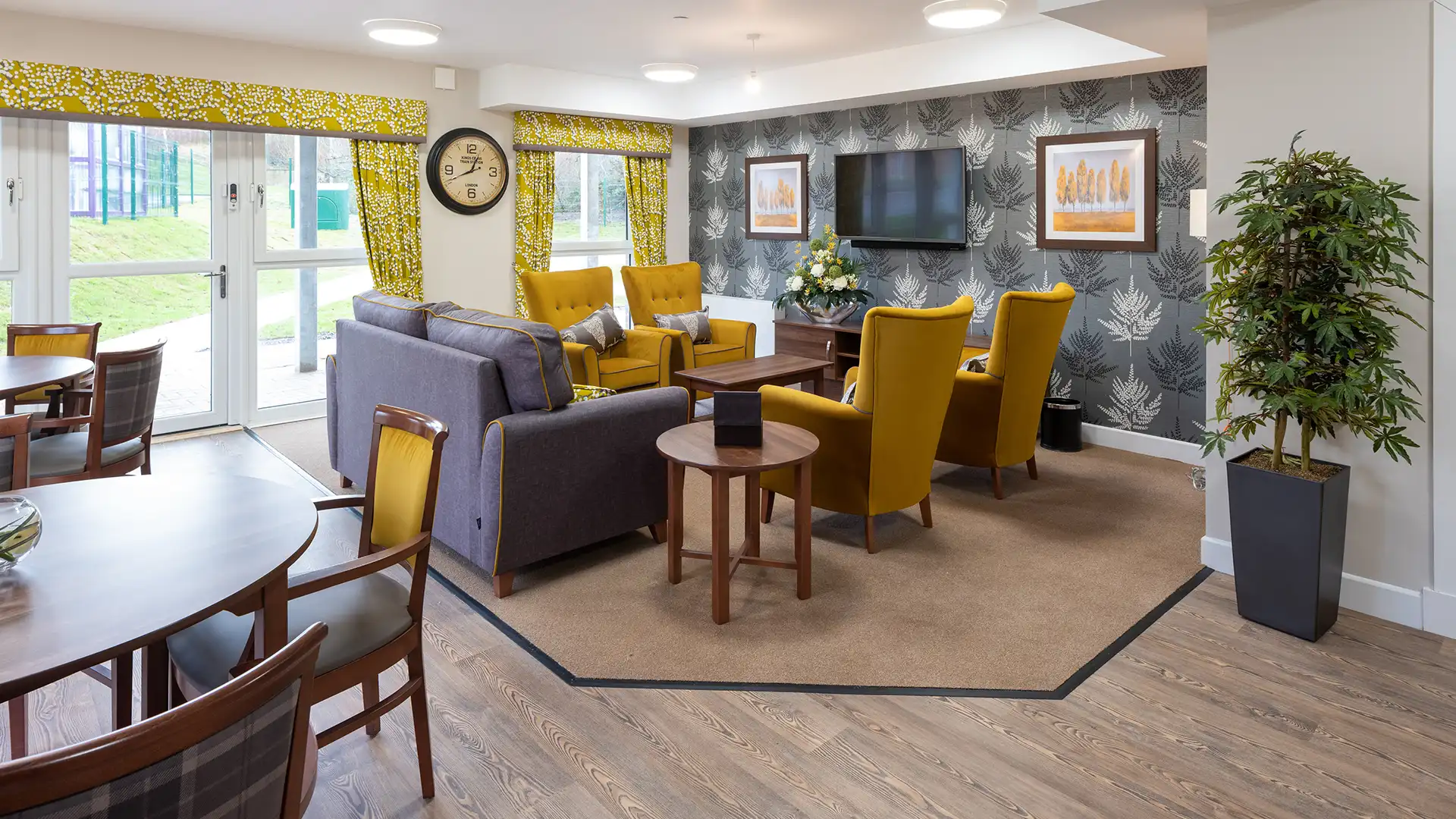 Cozy common area with seating and decor.