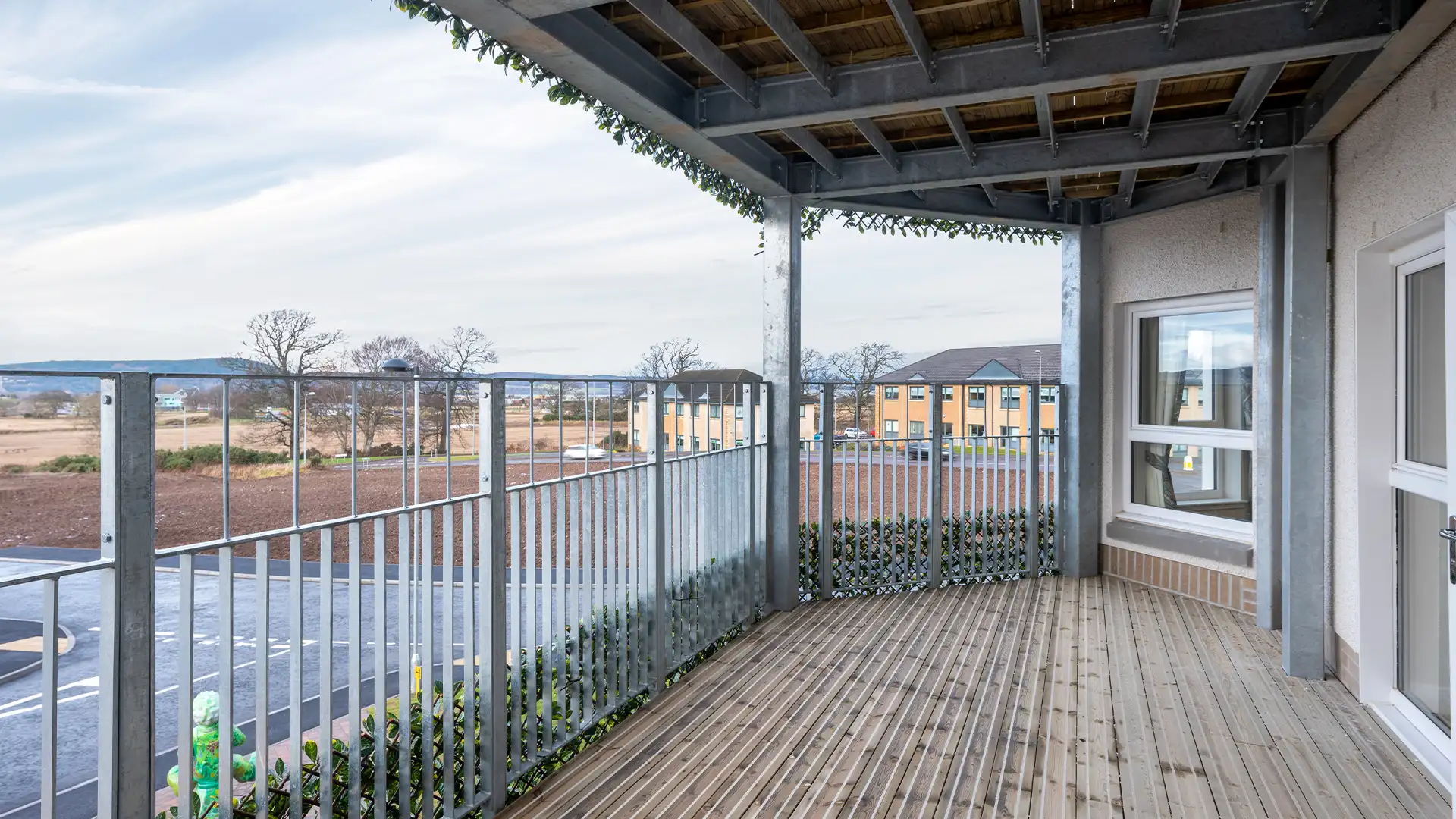 Outdoor balcony area with scenic view