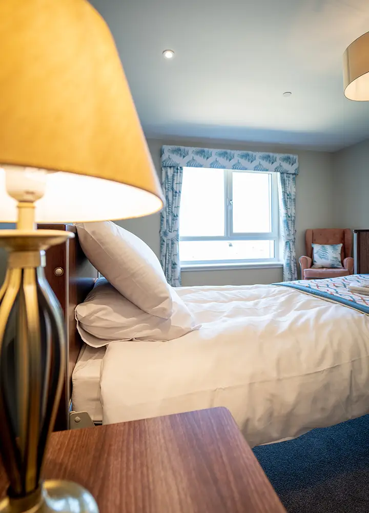 Cozy bedroom with a lamp and decor