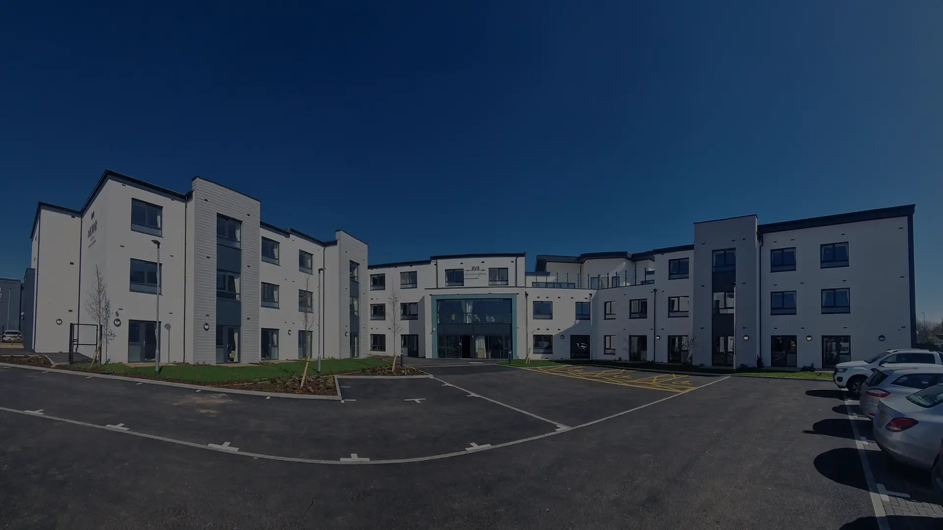 Exterior view of a modern assisted living facility.