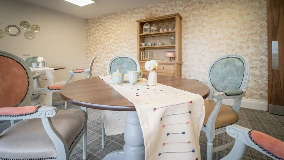 Cozy common area with dining table and decor