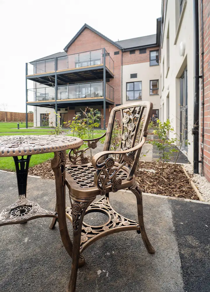 Outdoor seating area with view of the building