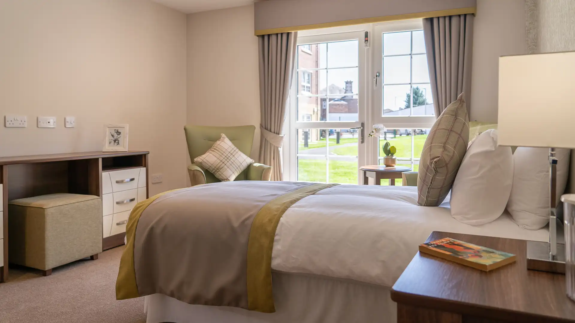 Cozy private resident room with window view.