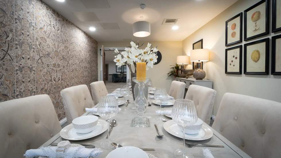 Elegant dining area set for a meal