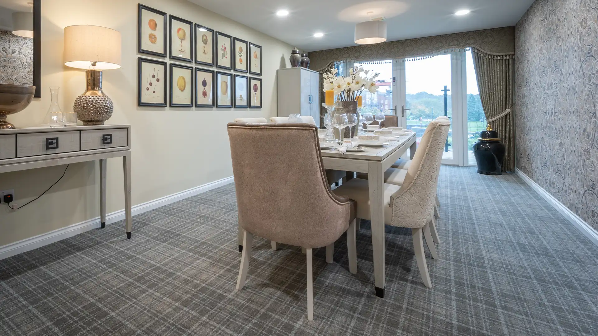 Elegant dining area with modern decor and artwork.