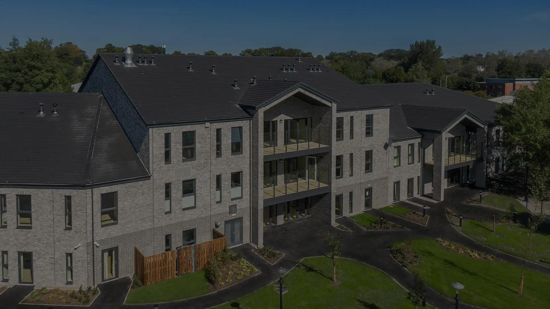 Exterior view of a modern assisted living facility.
